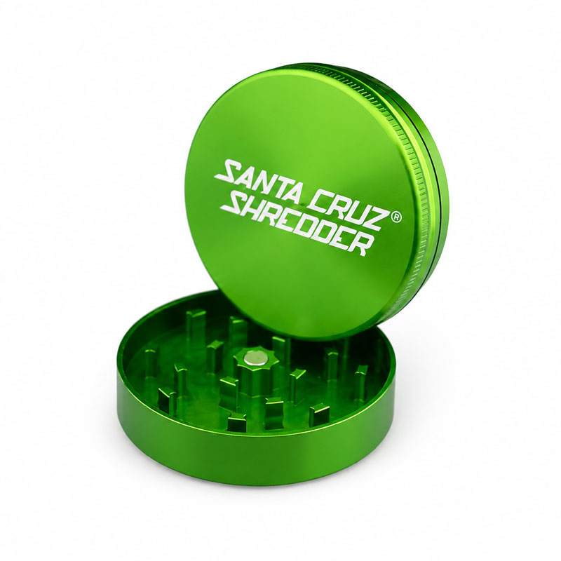 Angled green Santa Cruz Shredder grinder showing the branded top lid.