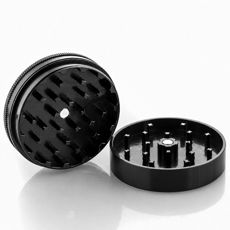 Black Santa Cruz Shredder 2-piece grinder separated to show the grinding teeth.
