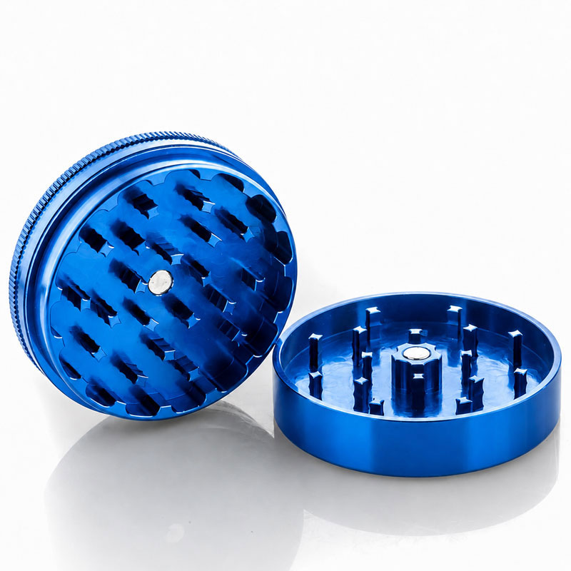 Blue Santa Cruz Shredder grinder opened to show the sharp internal teeth.