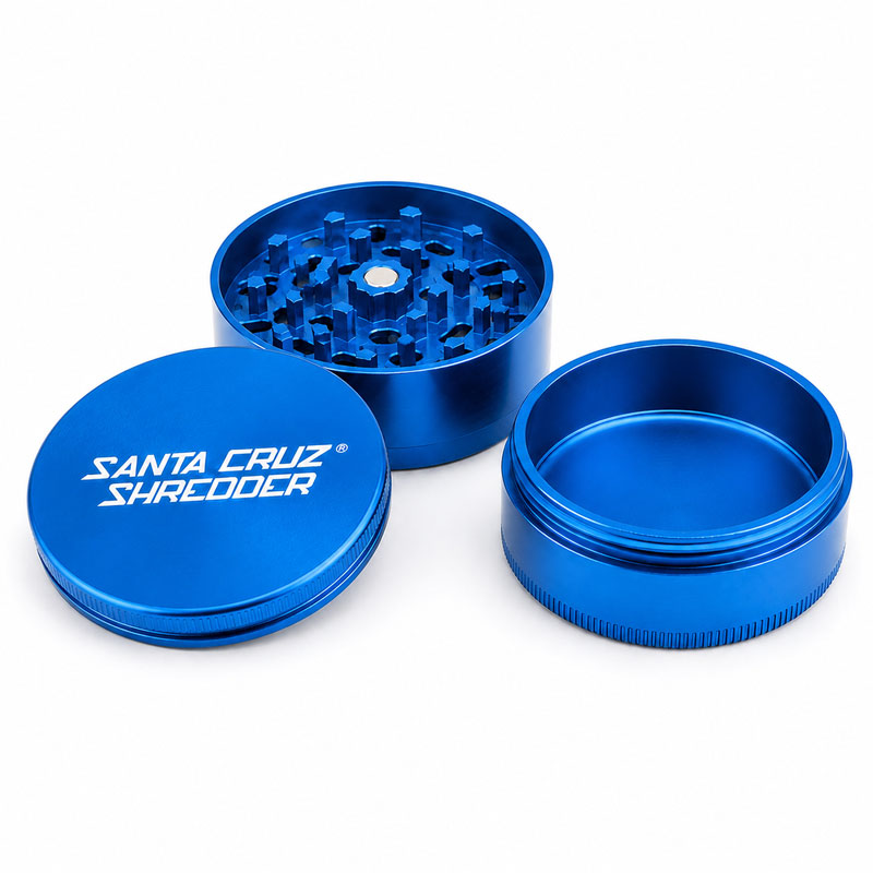 Santa Cruz Shredder blue 3-piece herb grinder opened to show the teeth and chamber.