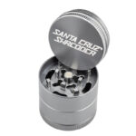 Grey Santa Cruz Shredder 3-Piece Grinder Small open with logo lid and grinding teeth
