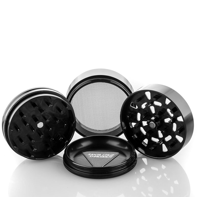Black Santa Cruz Shredder 4-Piece Grinder Large separated to show teeth, screen and pollen chamber