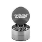 Grey Santa Cruz Shredder 4-Piece Grinder Large open with logo lid and herb chamber