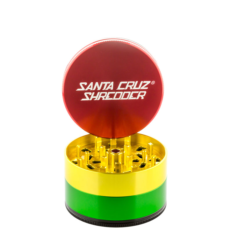 Rasta Santa Cruz Shredder 4-Piece Grinder Large open with red lid, yellow teeth and green chamber