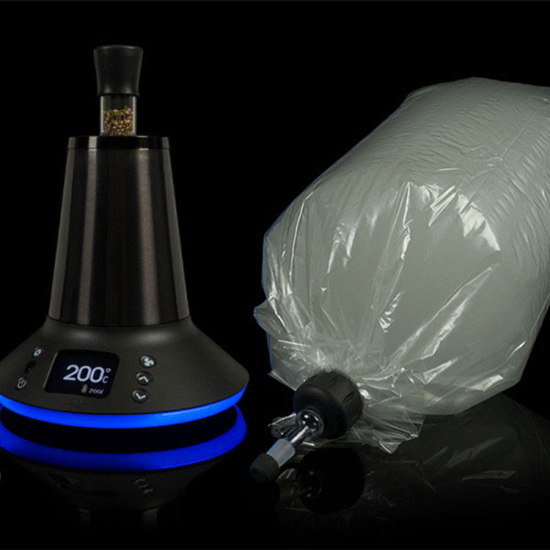 Arizer XQ2 desktop vaporizer with balloon bag on a black background