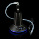 Arizer XQ2 vaporizer with whip attachment on a black background