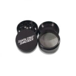 Black Santa Cruz Shredder 4-piece grinder open with screen and lid