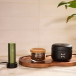 PAX Flow charging dock beside vaporizer