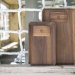 Marley Natural walnut rolling tray and scraper displayed in a lifestyle setting