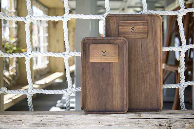 Marley Natural walnut rolling tray and scraper displayed in a lifestyle setting