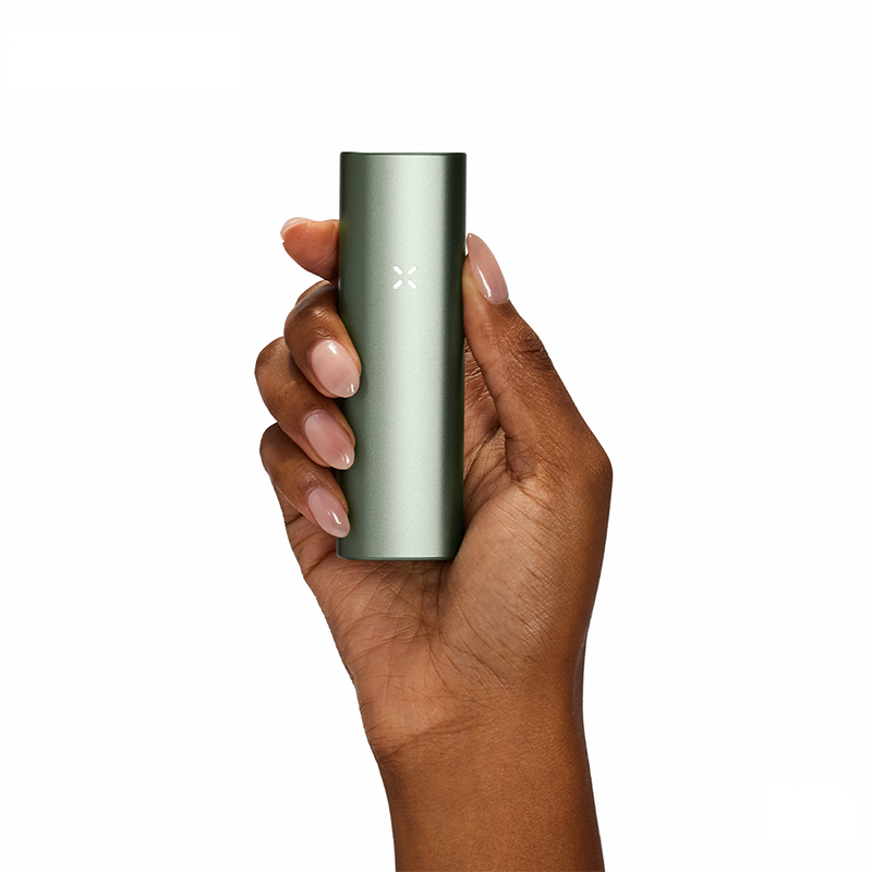 PAX Plus sage dry herb vape held in a hand