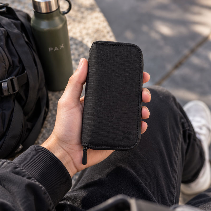 PAX Smell Proof Case held outdoors during everyday travel