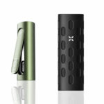 PAX Flow vaporizer with green finish beside a black PAX Flow grip sleeve on a white reflective background.