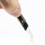 Puffco hot knife with wax on the tip