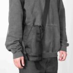 Person wearing Puffco Journey Bag across shoulder