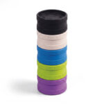 All colours of hemp grinder stacked on top of each other