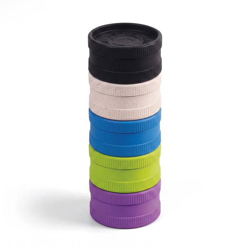 All colours of hemp grinder stacked on top of each other