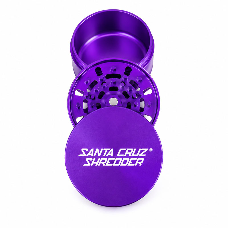 Purple Santa Cruz Shredder 3-piece grinder arranged open with the lid, teeth and chamber visible on a white background.