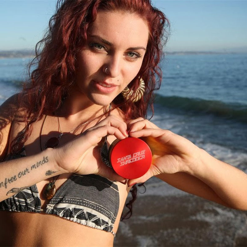 Woman holding large santa cruz shredder