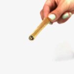 Shine 24K Gold cone filter held in hand