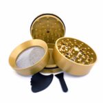 Gold SLX Non-Stick Grinder open with herb chamber and pollen scoop