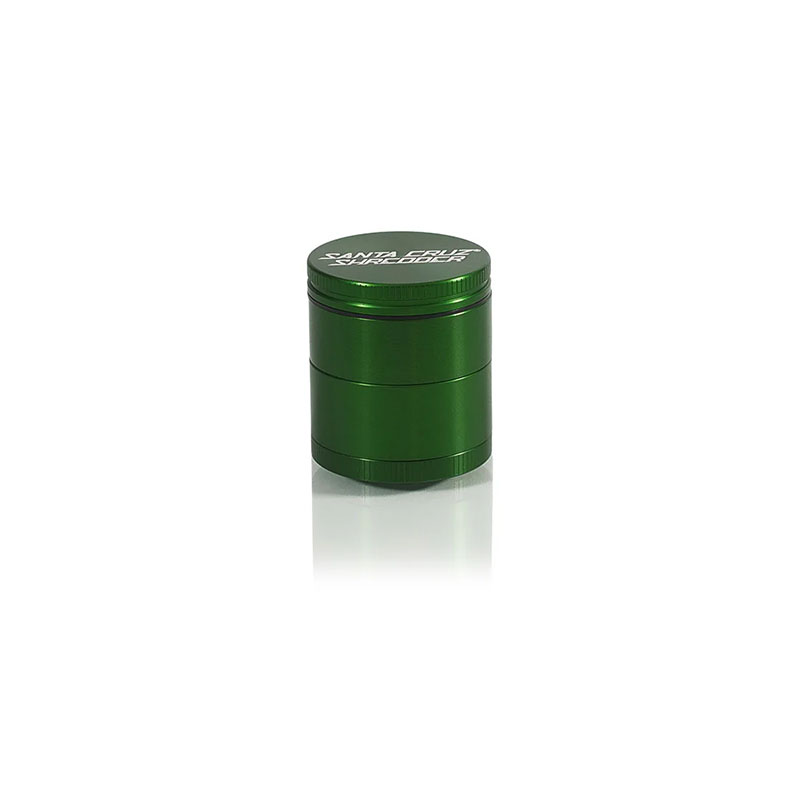 Small green grinder with white background