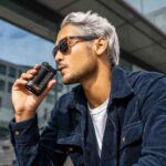 Storz & Bickel Crafty+ vaporizer used in a relaxed outdoor setting