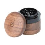 Wooden herb grinder with magnetic lid open