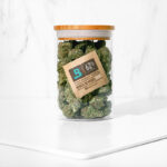 Boveda 62% humidity pack beside a small airtight jar of herbs