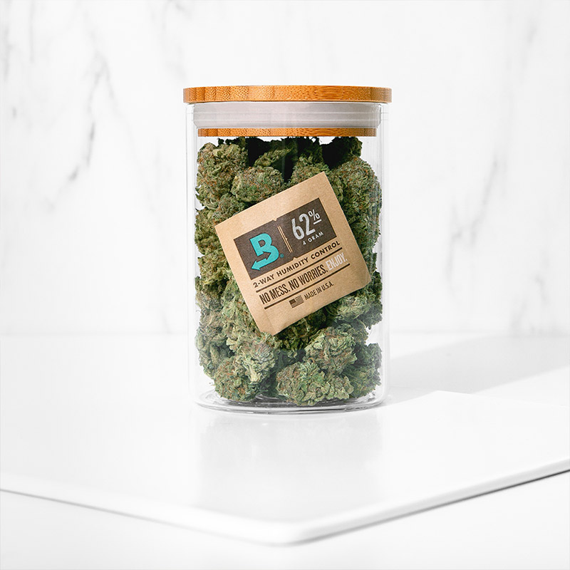 Boveda 62% humidity pack beside a small airtight jar of herbs