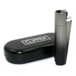 Clipper gradient lighter beside storage tin