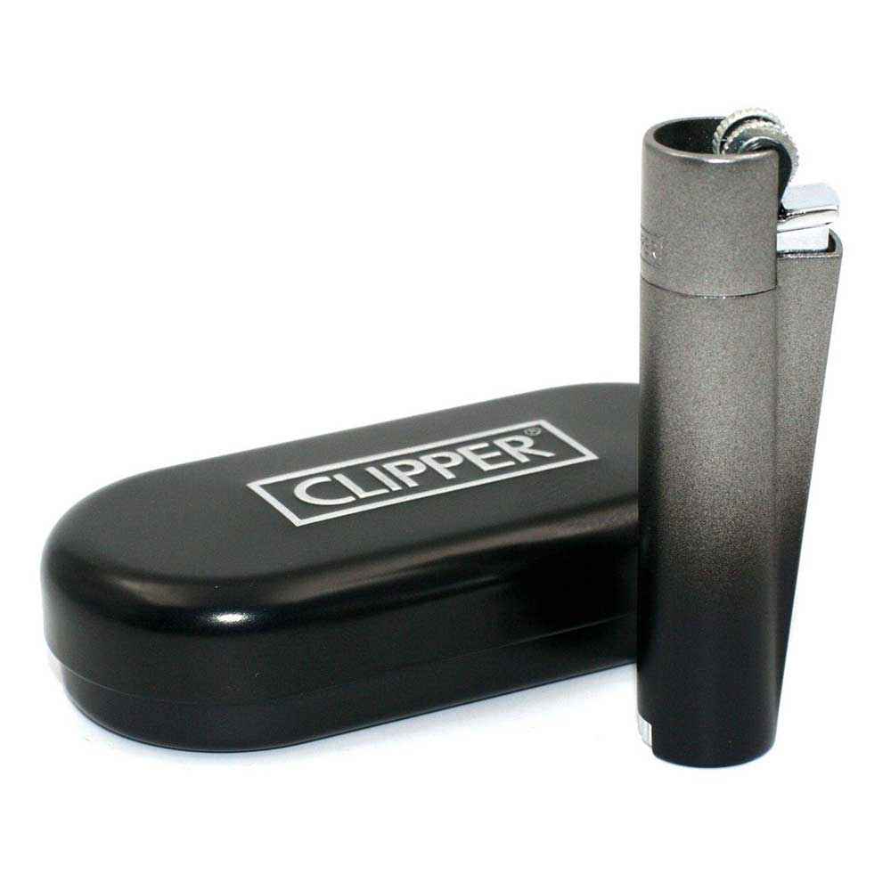 Clipper gradient lighter beside storage tin