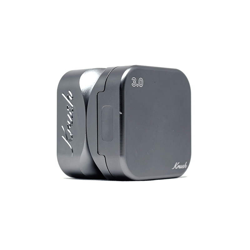 Krush Kube 3.0 grey grinder angled to show cube-shaped body