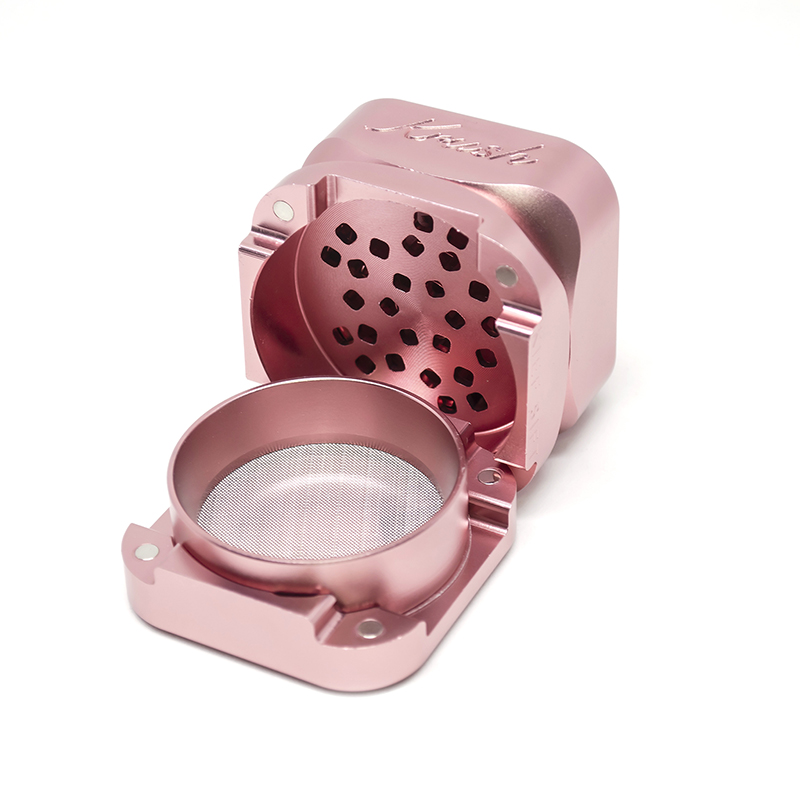 Krush Kube 3.0 rose gold grinder showing screen and loading tray