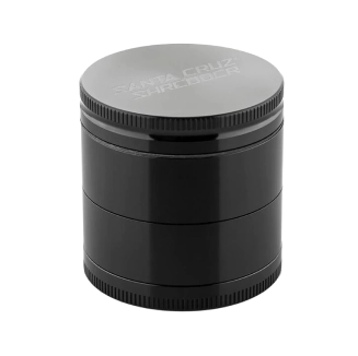 Black herb grinder on white background