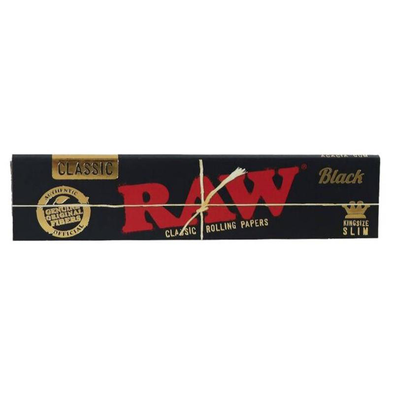 One pack of RAW Black Kingsize Slim unrefined rolling papers featuring black and gold packaging, red RAW logo, and eco-friendly natural fibre design.