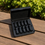 Arizer Go SRT shell case with preloaded shells displayed open on a wooden outdoor table in natural sunlight.