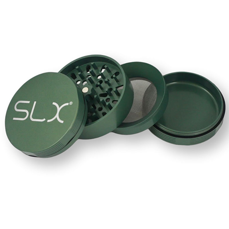 Green SLX BFG Grinder with grinding teeth and mesh screen.