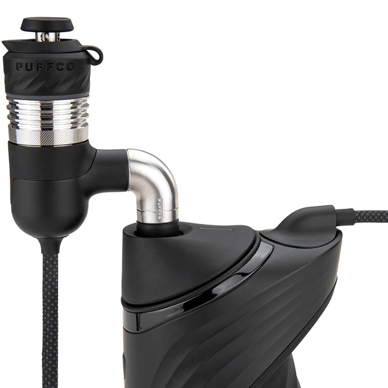Puffco Peak Pro adapter connected to the device with braided cable attached
