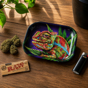 V-Syndicate Chameleon rolling tray on a wooden table beside rolling papers, lighter and herb in natural light