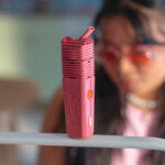 image of the pink veazy with a woman in the background
