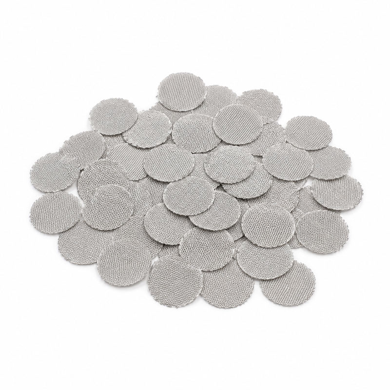 Close-up of Arizer Go SRT stainless steel filter strainers arranged in a loose pile on a white background.