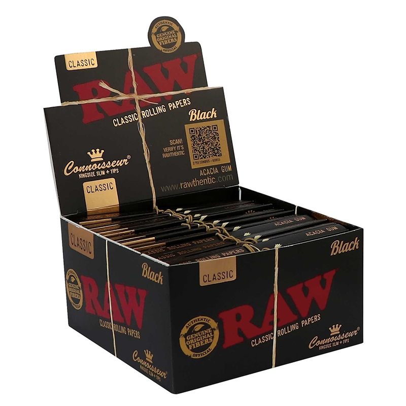 Full display box of RAW Black Connoisseur rolling papers plus tips on white background