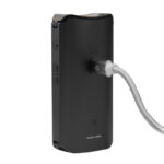 Black DaVinci IQ Core vaporizer connected to a USB-C charging cable
