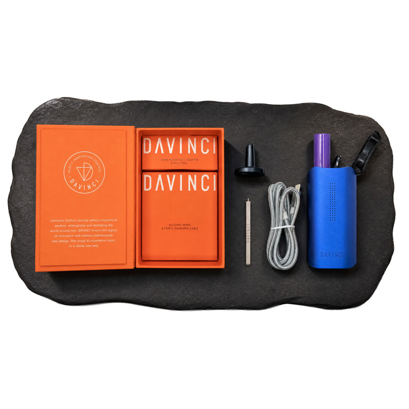 DaVinci IQ Core blue vaporizer with charging cable, cleaning tool and included accessories