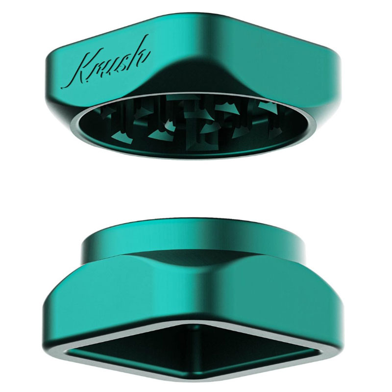 Emerald green Krush Kube 2.0 aluminium grinder opened to show its grinding teeth and two-part design