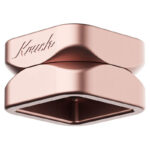 Rose gold Krush Kube 2.0 grinder showing its square two-part design and Krush logo