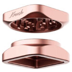 Separated view of the rose gold Krush Kube 2.0 XL showing both grinder sections and grinding teeth