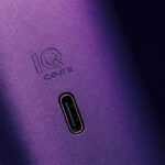 Close-up of the USB-C charging port on the purple DaVinci IQ Core vaporizer