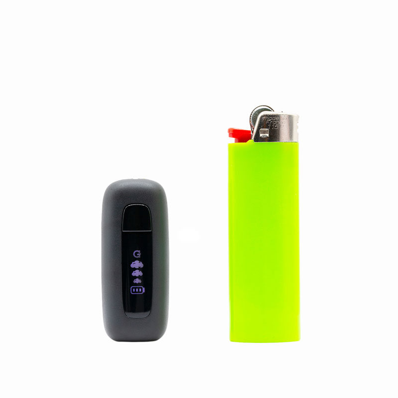 G Pen 510 OG battery displayed beside a standard lighter for size comparison